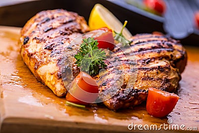 Grilled chicken breast in different variations with cherry tomat Stock Photo