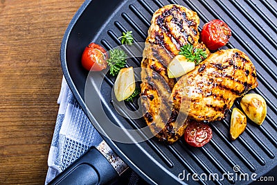 Grilled chicken breast in different variations with cherry tomat Stock Photo