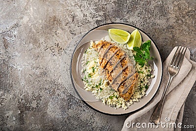 Grilled chicken breast with herb couscous Stock Photo