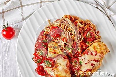 Grilled chicken breast with mozzarella and pasta Stock Photo