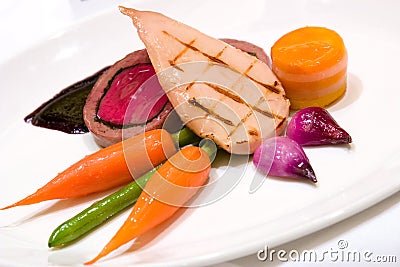 Grilled Chicken Breast with Veal Tenderloin Terrine Stock Photo