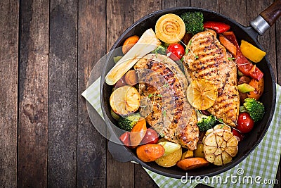 Grilled chicken breast and vegetables Stock Photo