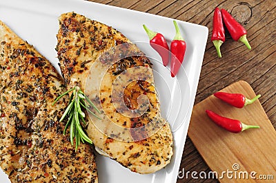 Grilled chicken fillets with fines herbes Stock Photo