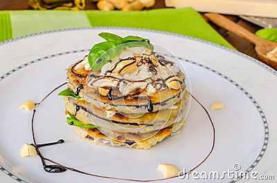 Grilled eggplant with feta cheese,parmesan basil, nuts Stock Photo