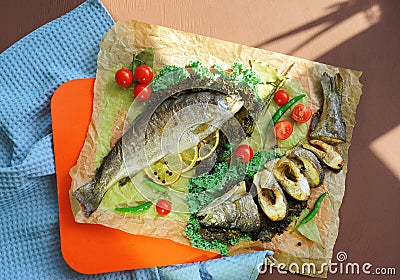 Grilled fish with vegetables ready to eat. Healthy lifestyle. Food art. Restaurant menu. Colourful dish. Beautiful food. Stock Photo
