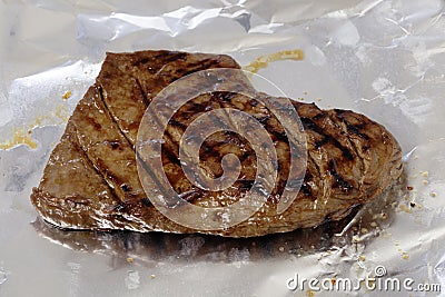 Grilled flank steak resting Stock Photo