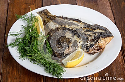 Grilled flounder on the white plate Stock Photo