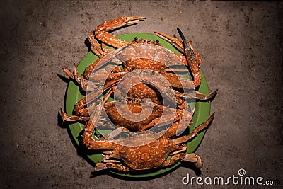 Grilled flower crabs at campfire Stock Photo