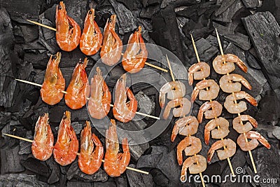 Grilled food. Charcoal skewers shrimps and tiger prawns Stock Photo