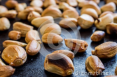 Grilled garlic cloves Stock Photo