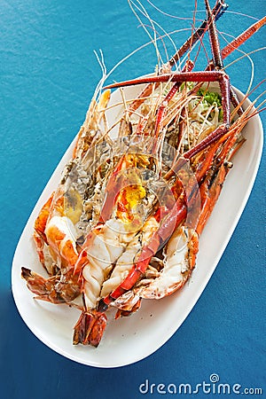 Grilled Giant freshwater prawn on plate Stock Photo