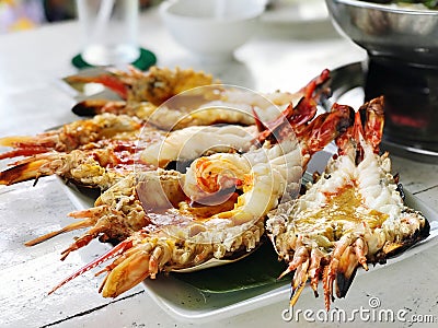 Grilled Giant River Prawns with Spicy Seafood Sauce. Stock Photo