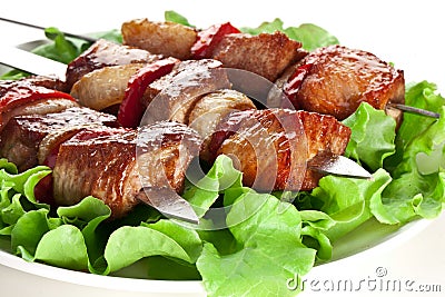 Grilled kebab (shashlik) on spits. Stock Photo