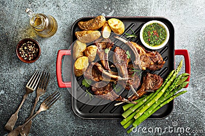 Grilled lamb chops with asparagus and potatoes Stock Photo