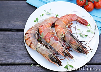 Grilled large shrimp on a plate Stock Photo