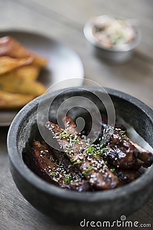 Grilled marinated pork ribs with sweet sesame sauce Stock Photo