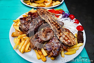 Grilled meat with fries , meat cutlets Croatian dish Stock Photo