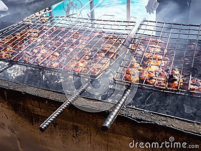 Grilled meat roasted skewers barbecue. Barbeque churrasco meat background. Appetizing meat roasted BBQ grill outdoor Stock Photo