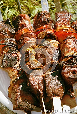 Grilled meat on a skewer. Close up Stock Photo