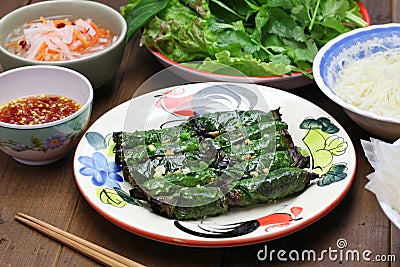 Grilled minced beef wrapped in betel leaf, vietnamese cuisine Stock Photo