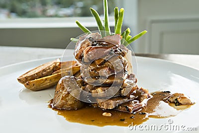 Grilled New York Pave with Beans and Gravy Stock Photo