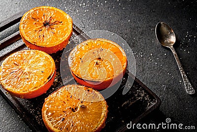 Grilled oranges with granola Stock Photo
