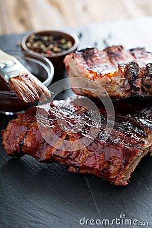 Grilled pork baby ribs with bbq sauce Stock Photo