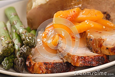 Grilled pork loin with peach sauce Stock Photo