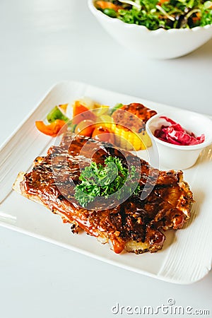 Grilled pork ribs with bbq sauce Stock Photo