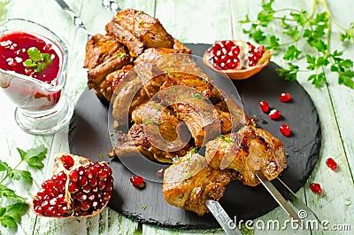 Grilled pork ribs on skewers. Barbecuing lunch Stock Photo