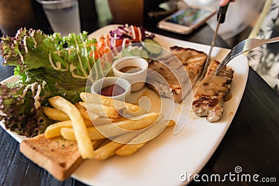 Grilled pork steak with vegetables Stock Photo