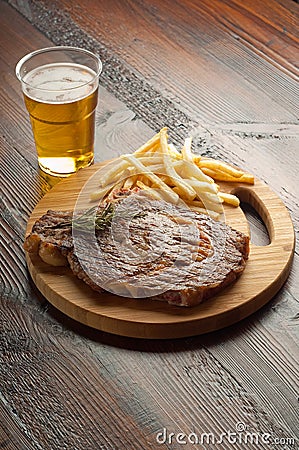 Grilled porterhouse with french fry and beer Stock Photo