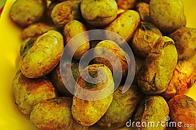 Grilled potatoes on a picnic on a sunny summer Stock Photo