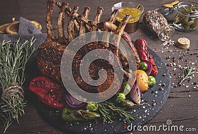 Grilled roasted Rack of lamb with vegetables. Stock Photo