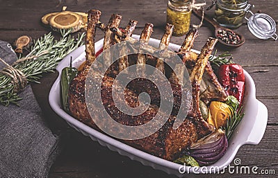 Grilled roasted Rack of lamb with vegetables. Stock Photo