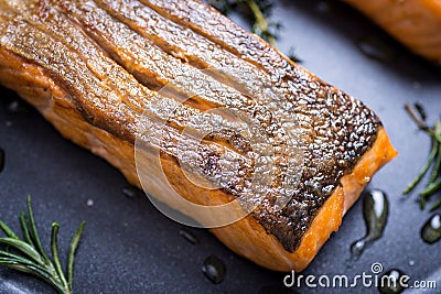 Grilled Salmon Fillets in Frying Pan Stock Photo