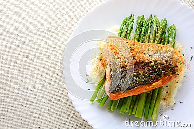 Grilled salmon garnished with asparagus Stock Photo