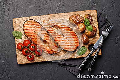 Grilled salmon steaks and potatoes Stock Photo