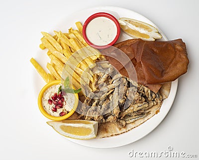 Grilled Sardines plate served with sauce on white Stock Photo