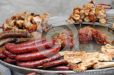 Grilled sausages, meats and kebabs Stock Photo