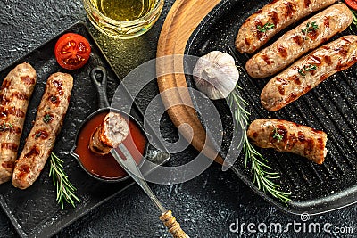 Grilled sausages with sauces and rosemary beer. traditional drink and food in pub Stock Photo