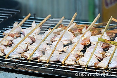 Grilled Skewer chicken and leg of chicken stick thai style barbeque on stove Stock Photo