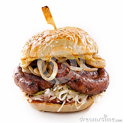 Grilled spicy bratwurst burger on a sesame bun Stock Photo