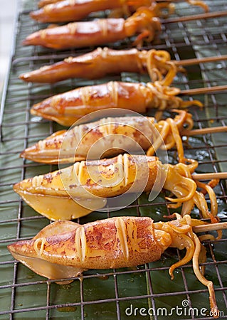 Grilled Squid, Thailand Food - Barbecue from squids sold on the Stock Photo