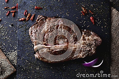 Grilled strip steak seasoned with different spices Stock Photo