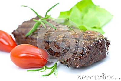 Grilled strip steak with tomato and salad Stock Photo
