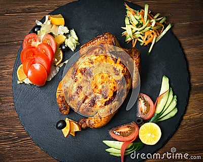 Christmas dinner with Grilled stuffed chicken and ingredients. Closeup Stock Photo