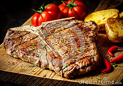 Grilled T-bone steak with vegetables Stock Photo