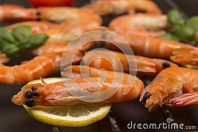 Grilled tiger shrimps on lemon. Healthly food Stock Photo