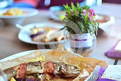 Grilled trout on a kitchen table Stock Photo